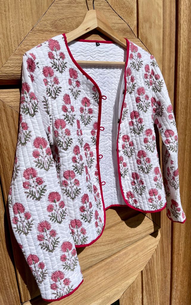 Short quilted reversible jacket