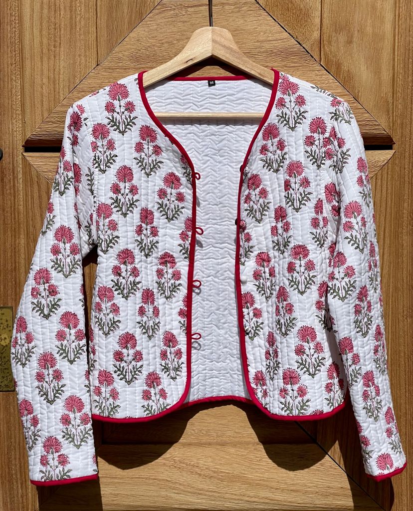 Short quilted reversible jacket